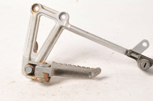 Kawasaki 35011-1356 Stay,Muffler Left Rear Passenger Footrest Bracket Peg EX250 - Very Good