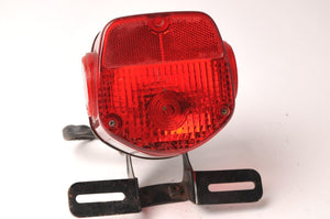 Kawasaki Taillight Assembly with bracket KZ400 1974-1977 | 23024-059-10 used - Very Good