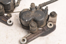 Load image into Gallery viewer, Used Brake Calipers Front Set for Honda Cb650SC CB650 Nighthawk | 45100-460 - Salvage
