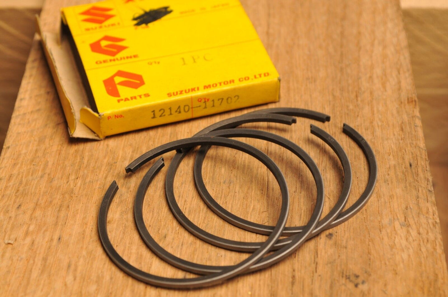 NOS OEM SUZUKI 12140-11702 RINGS RING SET(PISTON) +0.50 OS TC250 T20 1969 - Like New