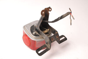 Kawasaki Taillight Assembly with bracket KZ400 1974-1977 | 23024-059-10 used - Very Good
