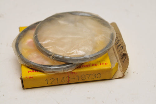NOS OEM SUZUKI 12140-18730 RING SET, PISTON T250RJ T250II 1.0MM OVERSIZE  - Like New