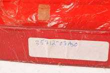 Load image into Gallery viewer, Genuine NOS Suzuki Tail Light Lens 35712-07A30 GV700 MADURA 1985 YEAR 35710-53