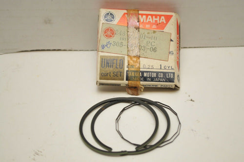 NOS OEM YAMAHA 248-11601-10-00  PISTON RING SET 305-02-02-06 OVERSIZE 0.25 AT1 - Motomike Canada