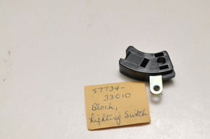 Genuine NOS Suzuki 57734-33010 Block,Lighting Switch Plate - GT550 INDY GT380 72 - Motomike Canada