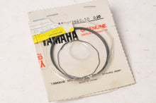 Load image into Gallery viewer, Genuine Yamaha 558-11610-10-00 Piston Ring Set 1st O/S +0.25mm DT100 MX100 +